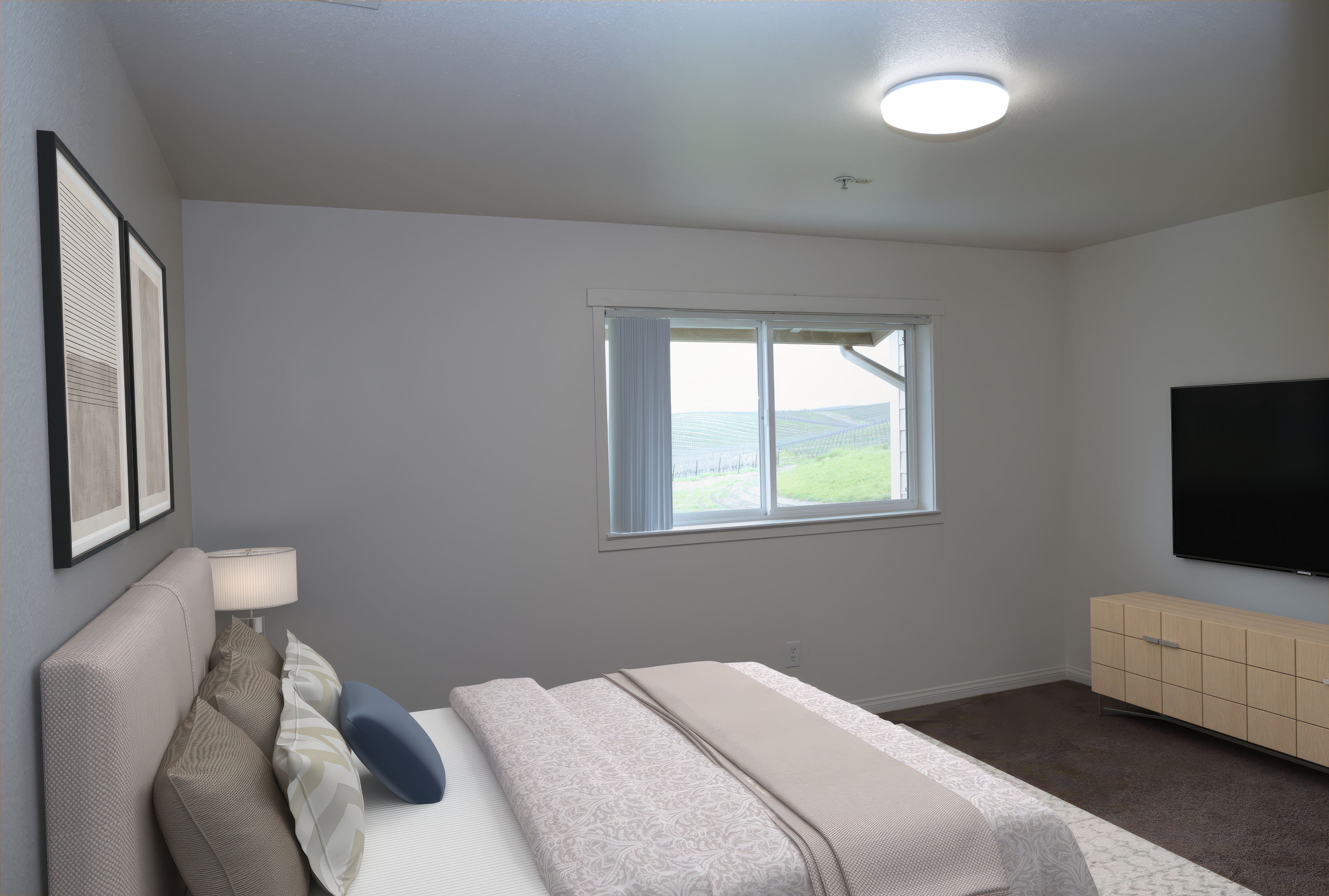 Carpeted bedroom staged with a bed and side table